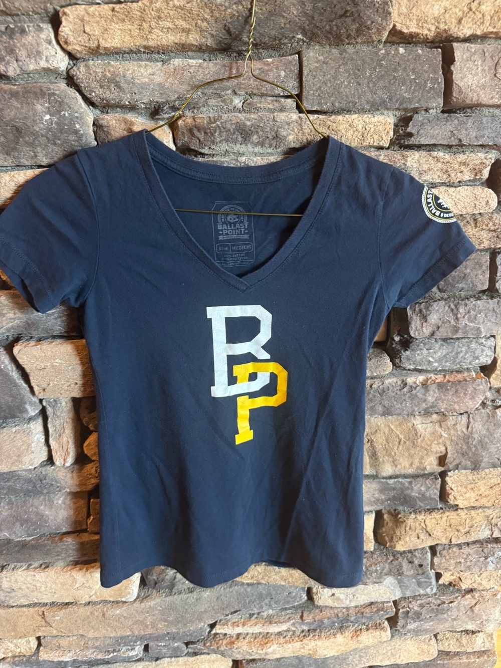 Ballast Point Women’s Navy V-Neck Tee with Yellow & White Logo